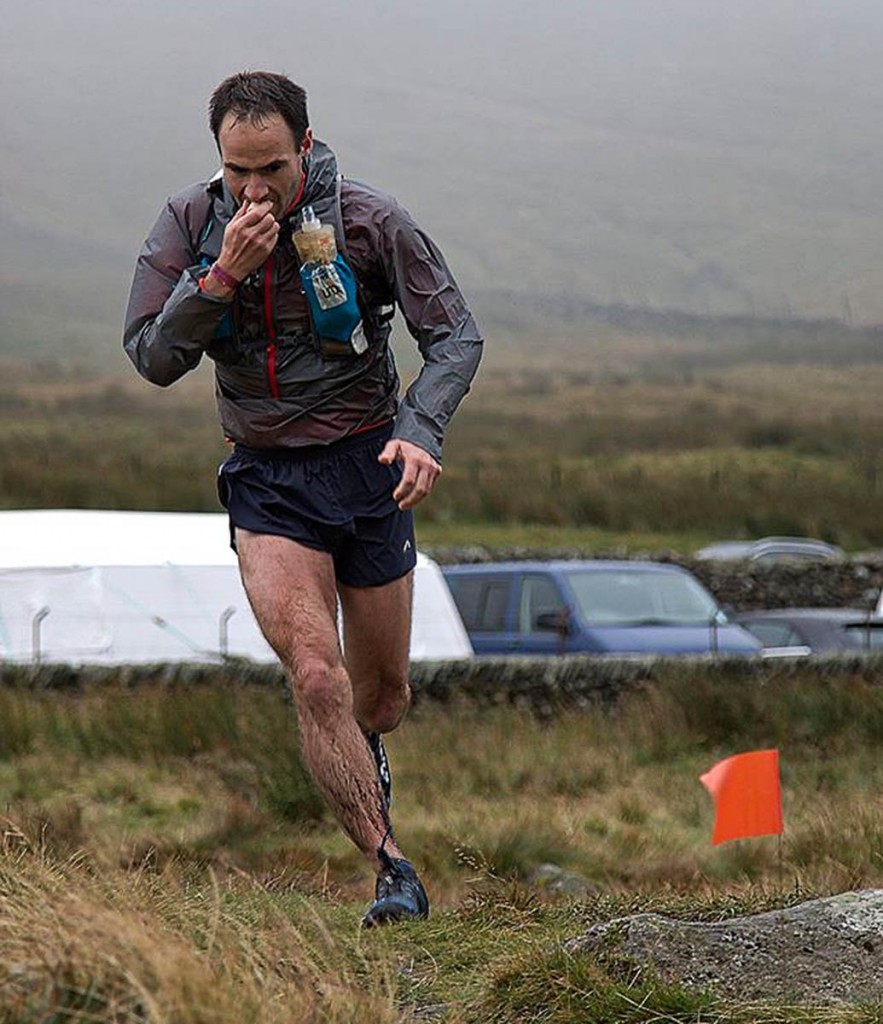 A runner refuels during the race. Photo: Andy Jackson