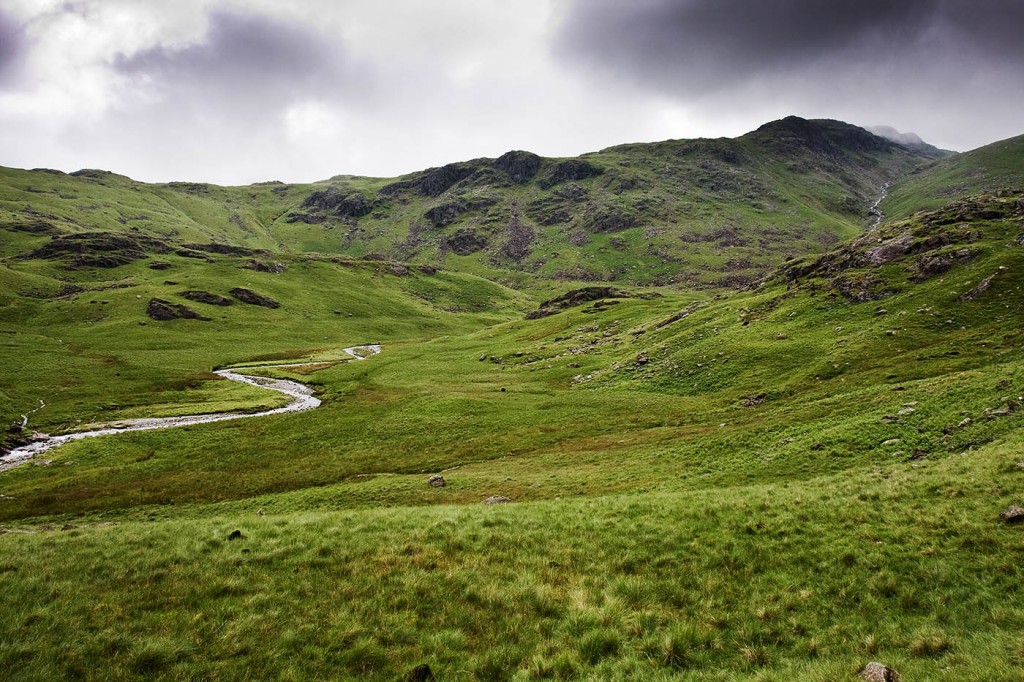 The exhausted walker was helped down to Lingcove Beck and then to the road The exhausted walker was helped down to Lingcove Beck and then to the road