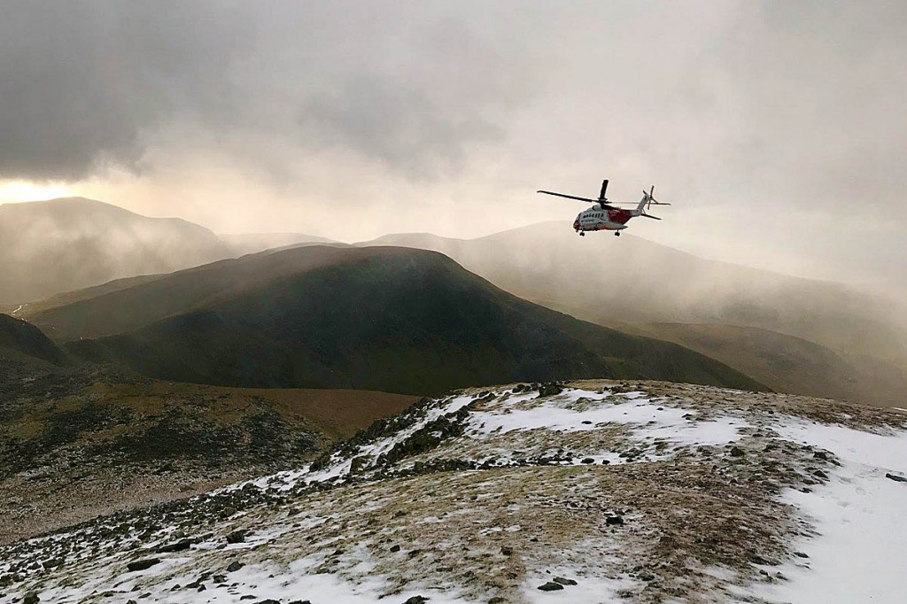 The Coastguard helicopter in action during the rescue. Photo: Llanberis MRT
