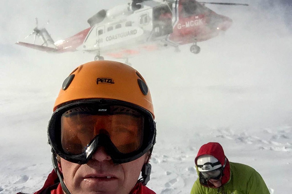 Rescuers on Glyder Fach with the Coastguard helicoper. Photo: Llanberis MRT