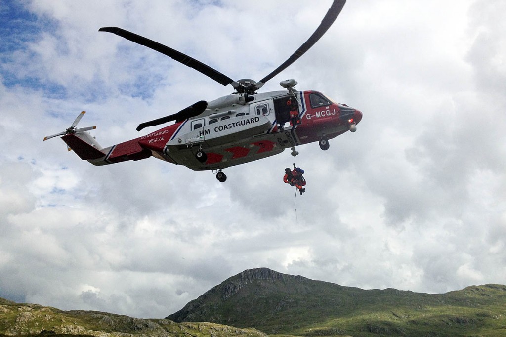 A casualty is winched into the Coastguard helicopter. Photo: Miles Hill A casualty is winched into the Coastguard helicopter. Photo: Miles Hill
