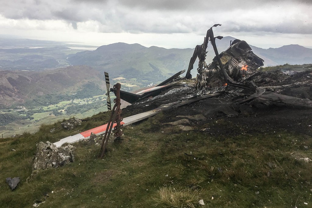 The charred remains of the aircraft on the summit of Yr Aran. Photo: Llanberis MRT