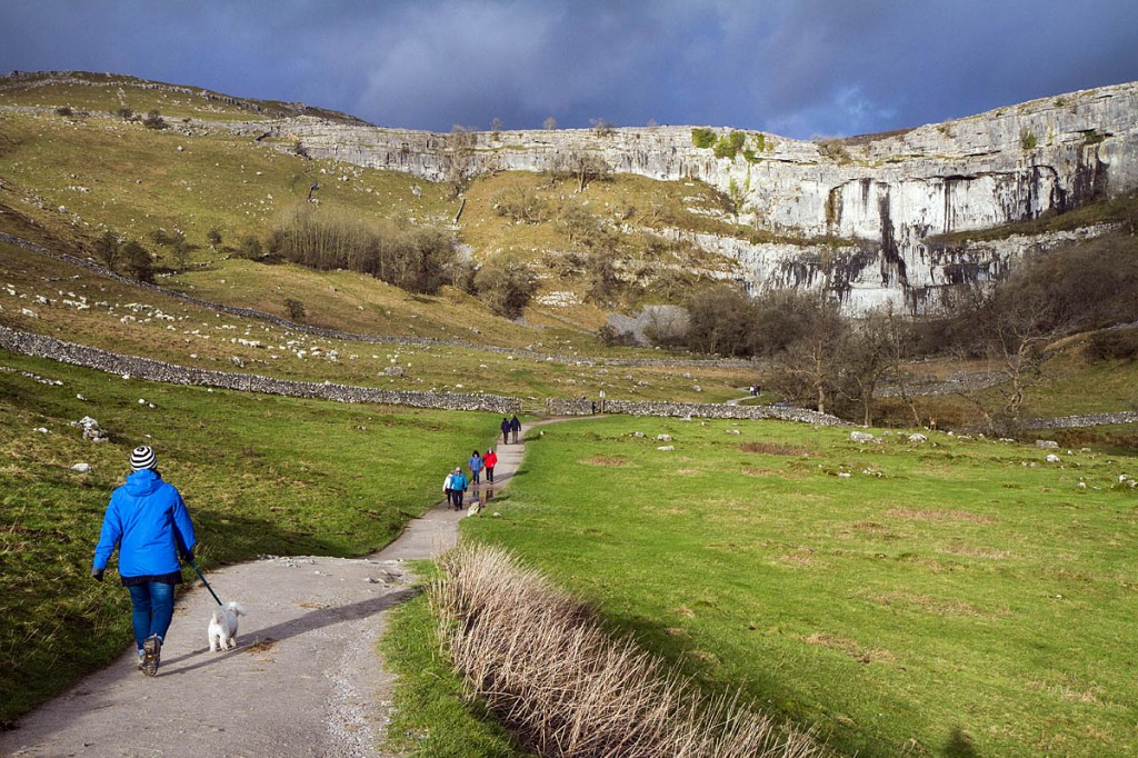 The woman slipped near the top of Malham Cove, the 80m limestone crag in the Yorkshire Dales