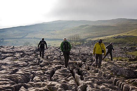 The walker got stuck after slipping on the limestone pavement above Malham Cove The walker got stuck after slipping on the limestone pavement above Malham Cove