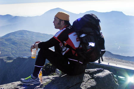 Mike Buss on the summit of Snowdon during his record challenge Mike Buss on the summit of Snowdon during his record challenge