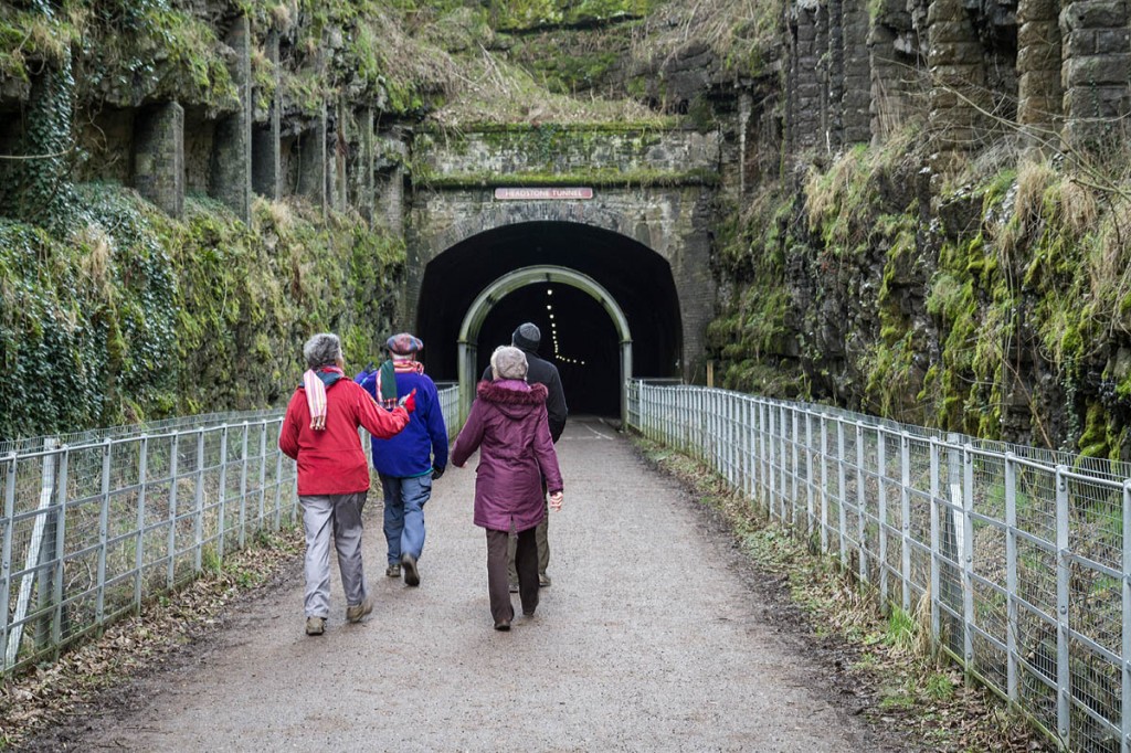 Walkers approach the Headstone Tunnel on the Monsal Trail
