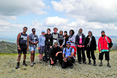 The walkers on Helvellyn's summit The walkers on Helvellyn's summit