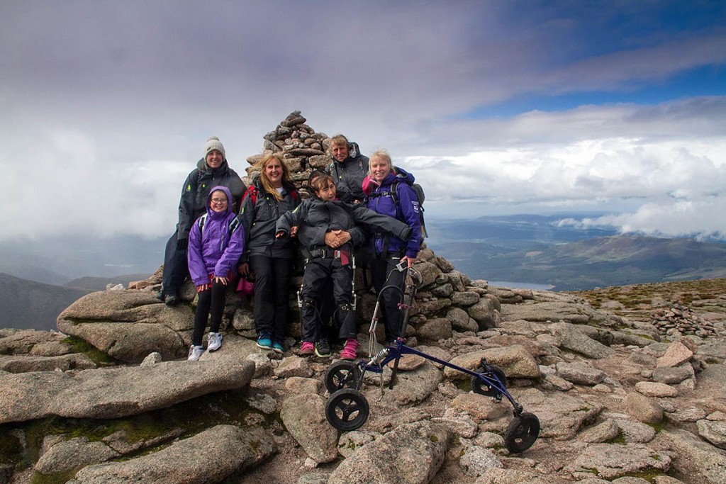 Natasha Lambert on the summit of Cairn Gorm with support team, including Heather Morning, right Natasha Lambert on the summit of Cairn Gorm with support team, including Heather Morning, right