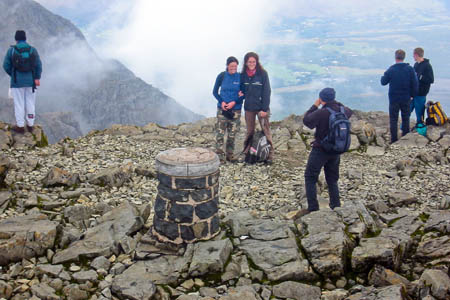 Summiteers pose on Ben Nevis, top of the list for British baggers Summiteers pose on Ben Nevis, top of the list for British baggers