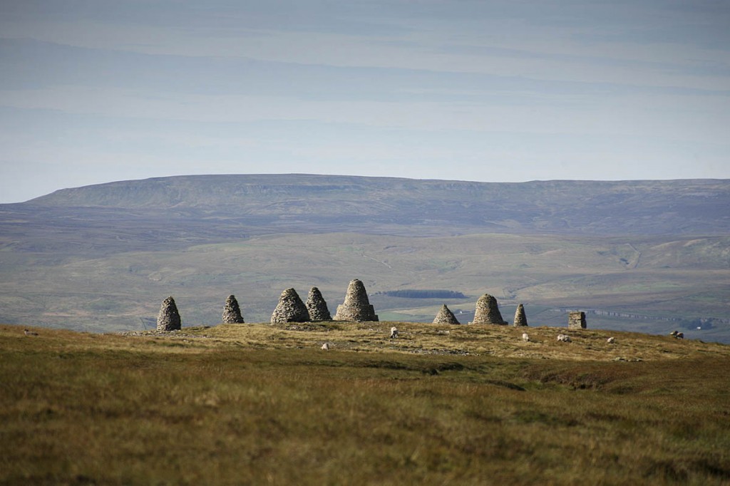 The cairns of Nine Standards Rigg overlook the Eden Valley. Photo: Bob Smith/grough