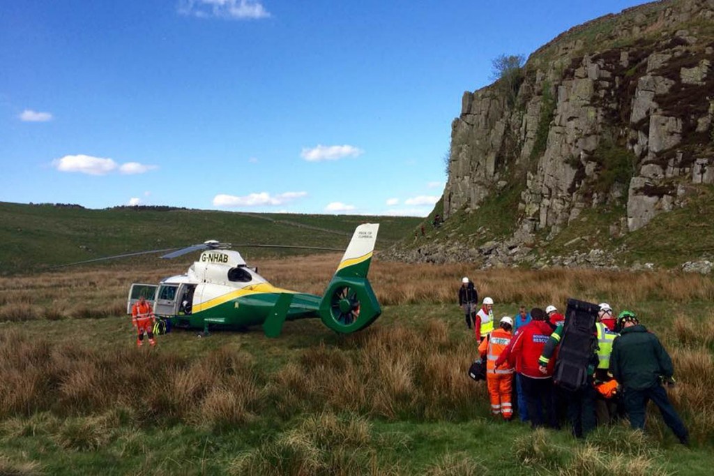The climber is stretchered to the helicopter. Photo: Northumberland NPMRT The climber is stretchered to the helicopter. Photo: Northumberland NPMRT
