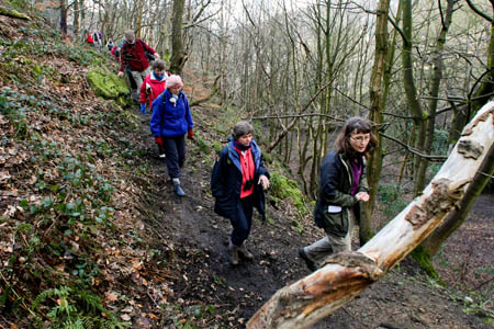 Kate Ashbrook, second from right, and Kate Berridge of Friends of Nutclough Woods, take a walk in the woods on the day Hebden Bridge first celebrated its Walkers Are Welcome status