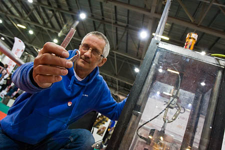 DMM brand manager Chris Rowlands with the karabiner tested to destruction DMM brand manager Chris Rowlands with the karabiner tested to destruction