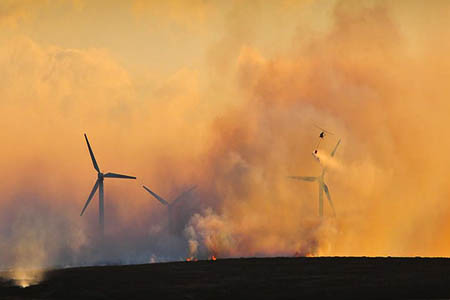 A wildfire on Ovenden Moor in the South Pennines A wildfire on Ovenden Moor in the South Pennines