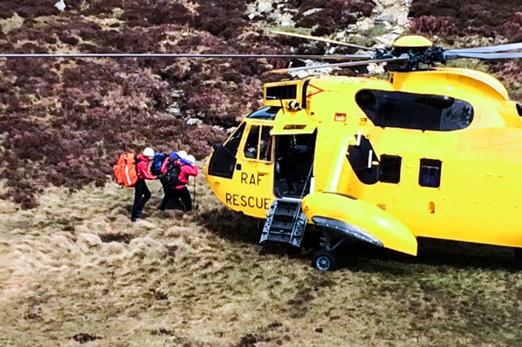 The walker is helped to the helicopter on Moel Siabod today. Photo: OVMRO The walker is helped to the helicopter on Moel Siabod today. Photo: OVMRO