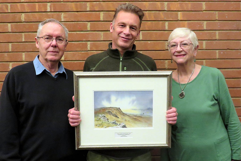 Chris Packham, centre, received his award from Peter and Leni Gillman Chris Packham, centre, received his award from Peter and Leni Gillman