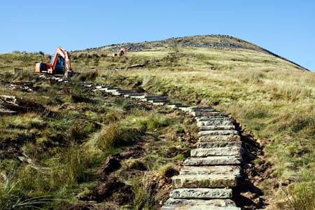 Path repairs on Little Ingleborough using reclaimed stone flags