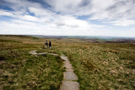Walkers on the Pennine Way in the South Pennines Walkers on the Pennine Way in the South Pennines