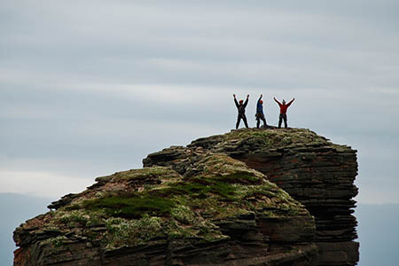 The three climbers on top of the Old Man of Hoy. Photo: Keith Partridge The three climbers on top of the Old Man of Hoy. Photo: Keith Partridge