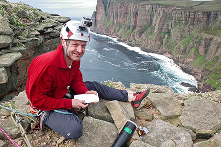 Red Széll on top of the sea stack. Photo: Nick Carter Red Széll on top of the sea stack. Photo: Nick Carter