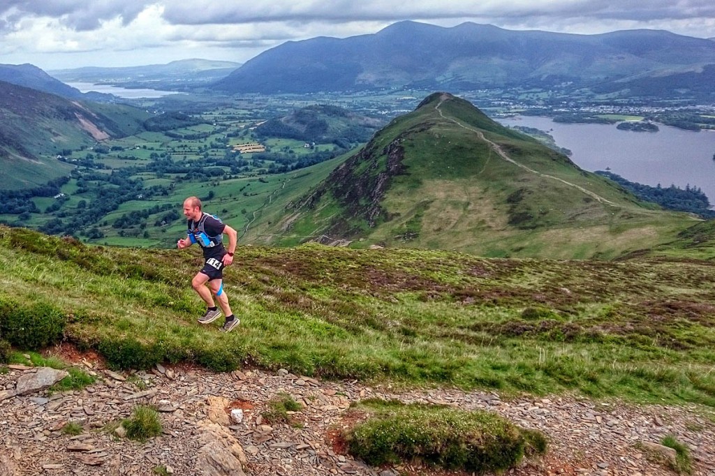 Rupert Bonington of Mountain Fuel running up towards Maiden Moor, the first peak in the 10 in10 MS Challenge, with Cat Bells in the background