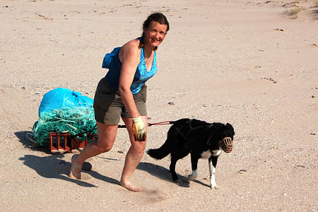 Patrick and his owner at work during the clean-up Patrick and his owner at work during the clean-up