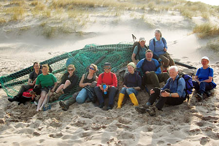 Volunteers at Sandwood Bay with the collected rubbish Volunteers at Sandwood Bay with the collected rubbish