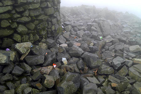 Rubbish should be taken from the mountain by visitors, not left at the summit Rubbish should be taken from the mountain by visitors, not left at the summit