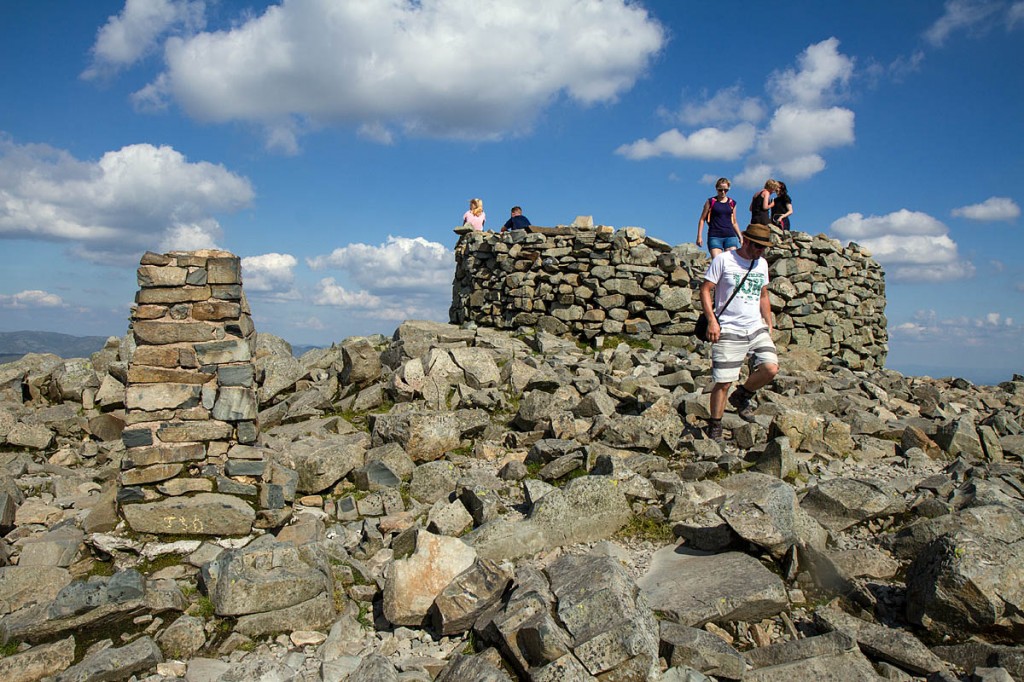 The summit of Scafell Pike, seldom a place for solitude in the summer months