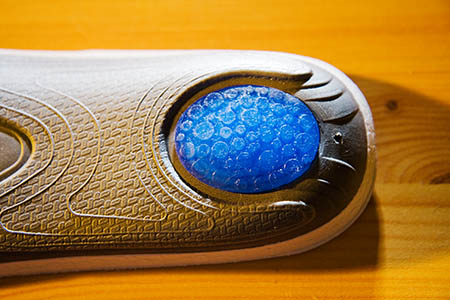 A gel insert cushions the heel A gel insert cushions the heel