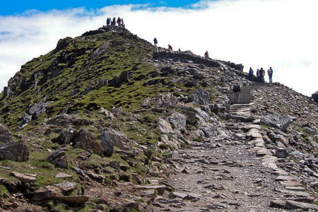 Snowdon's summit is rarely a place of solitude. Photo: Chris Worsley CC-BY-SA-2.0 Snowdon's summit is rarely a place of solitude. Photo: Chris Worsley CC-BY-SA-2.0