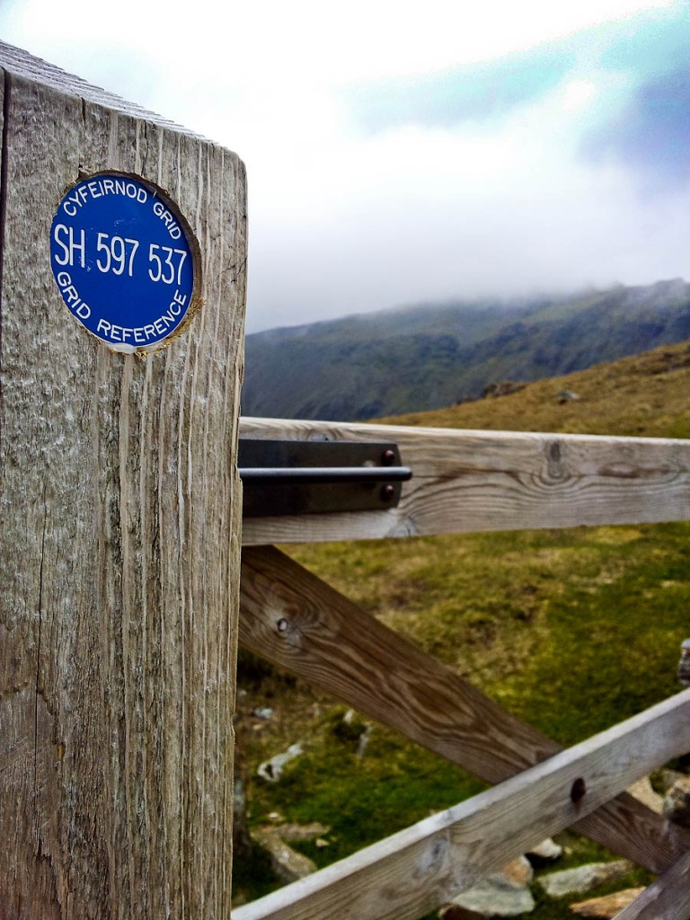 Oneof the grid reference plaques on a Snowdon gate. Photo: Snowdonia NPA