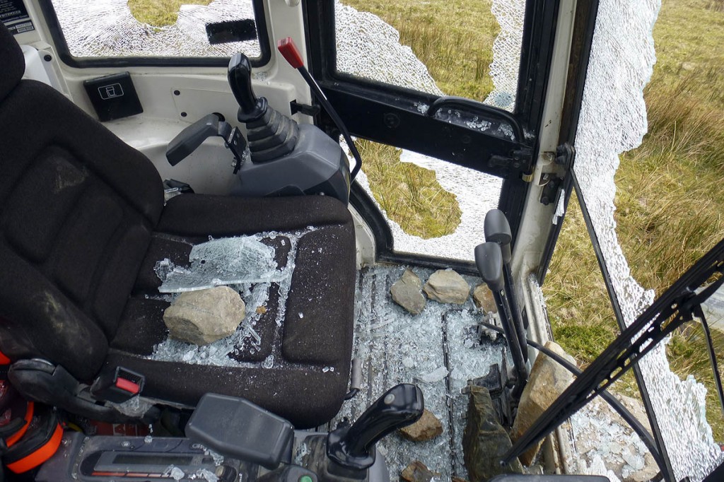 Stones were used to smash the digger's windows Stones were used to smash the digger's windows