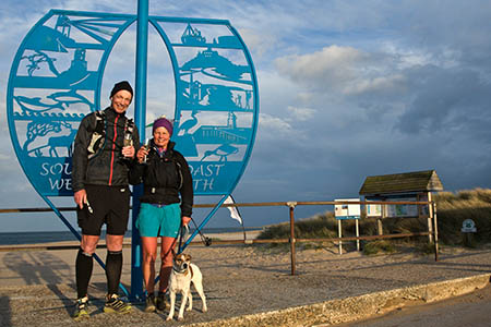 Mark Townsend and Julie Gardener raise a glass at the end of the South West Coast Path Mark Townsend and Julie Gardener raise a glass at the end of the South West Coast Path