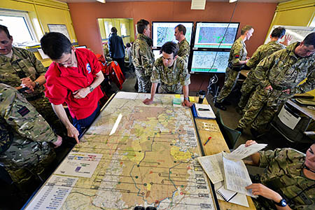 Staff in the operations room keep track of particpants. Photo: Corporal Si Longworth/MoD Staff in the operations room keep track of particpants. Photo: Corporal Si Longworth/MoD
