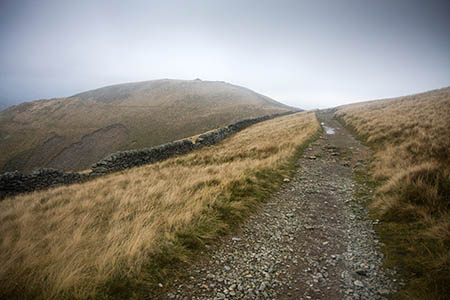 The girl was walking down from The Knott The girl was walking down from The Knott