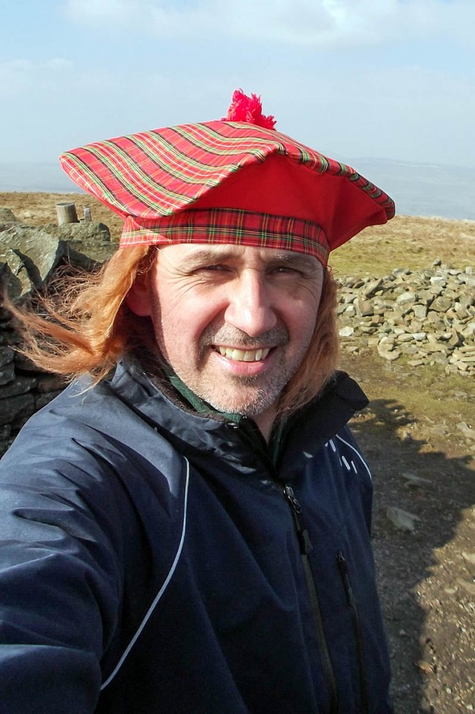 Steve Hastie heads up the challenge on the summit of Pen-y-ghent. Photo: Yorkshire Dales NPA
