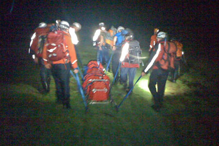 Wasdale MRT members stretcher the man from Great End Wasdale MRT members stretcher the man from Great End