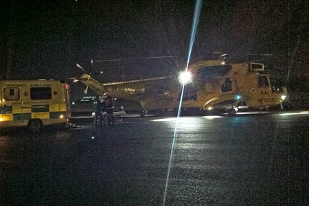 The Ewden Valley walker is transferred to an ambulance from the RAF Sea King. Photo: Woodhead MRT The Ewden Valley walker is transferred to an ambulance from the RAF Sea King. Photo: Woodhead MRT