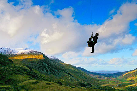 The injured walker is winched up into the RAF Sea King. Photo: OVMRO The injured walker is winched up into the RAF Sea King. Photo: OVMRO